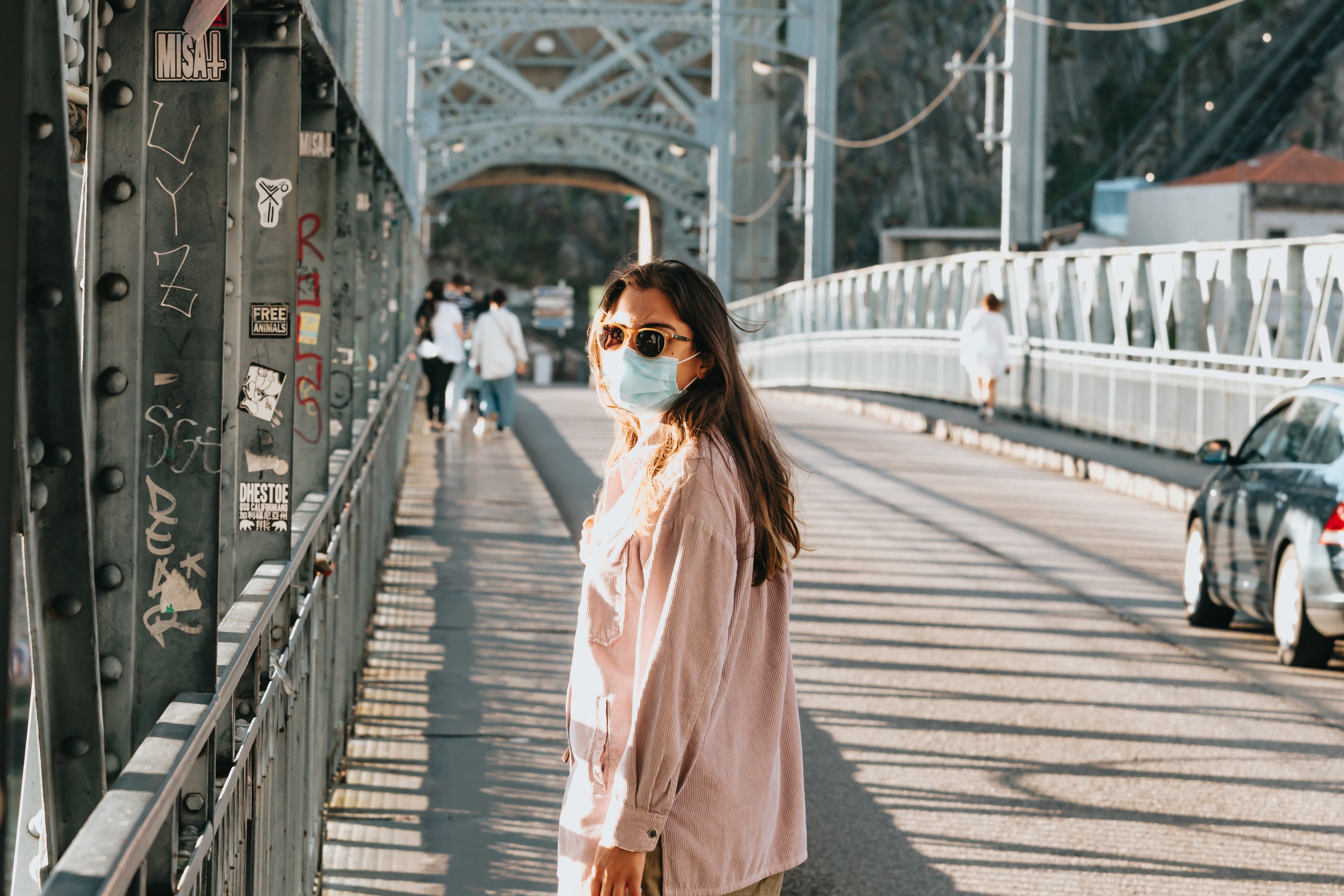 files/woman-on-a-bridge-in-a-facemask.jpg